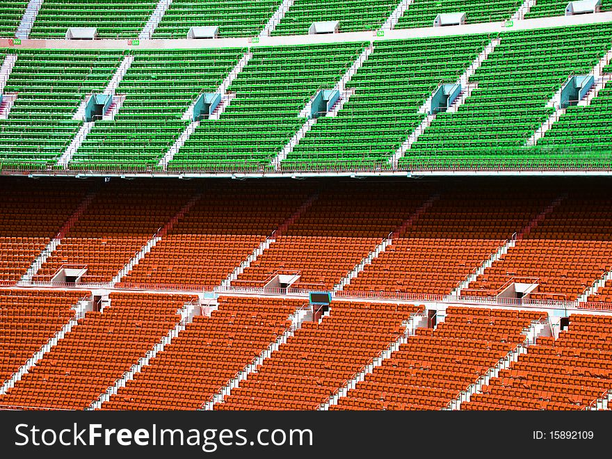 Colored chairs in a football stadium. Colored chairs in a football stadium