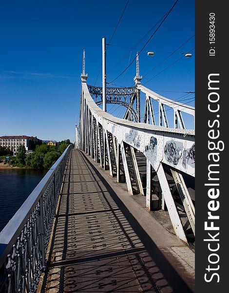 Old bridge at summer sunny day