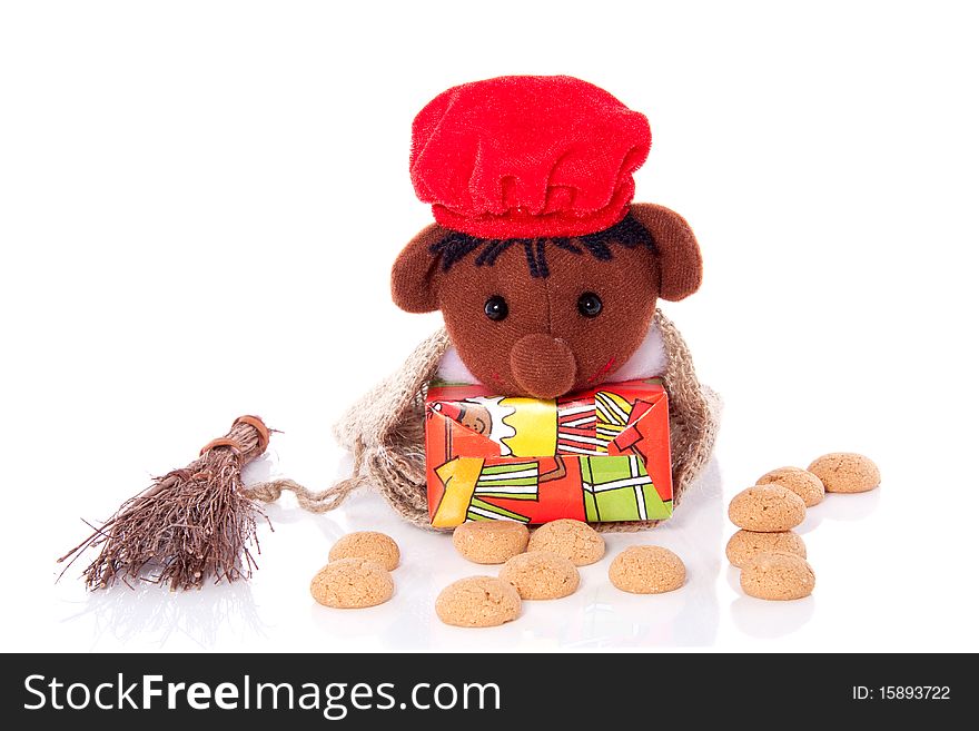 A typical Dutch celebration with gifts and gingerbread isolated over white