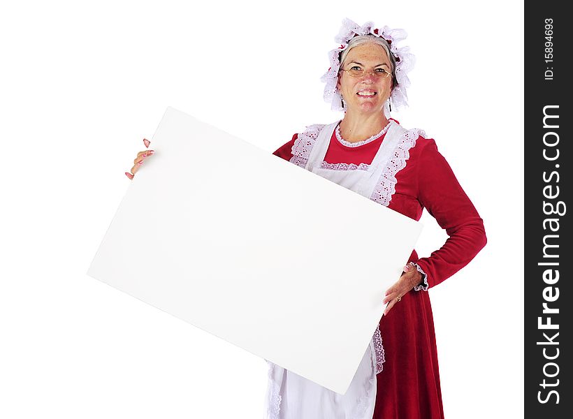 Mrs. Santa Claus holding a blank white sign for your text. Isolated on white. Mrs. Santa Claus holding a blank white sign for your text. Isolated on white.