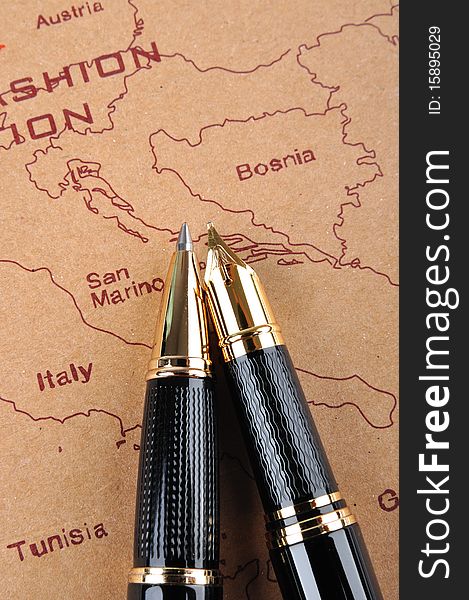 Two pens putting on a European map, means business and travel concept. Two pens putting on a European map, means business and travel concept.