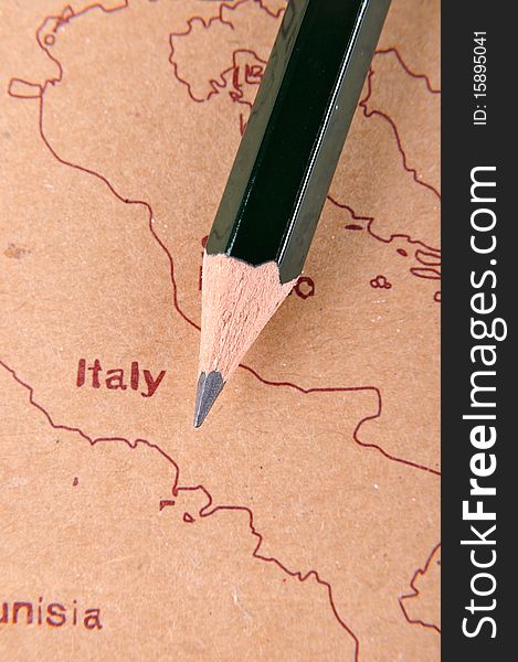 A pencil putting on a European map, means business and travel concept. A pencil putting on a European map, means business and travel concept.