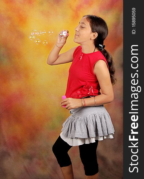 Beautiful girl blowing the bubbles. Beautiful girl blowing the bubbles