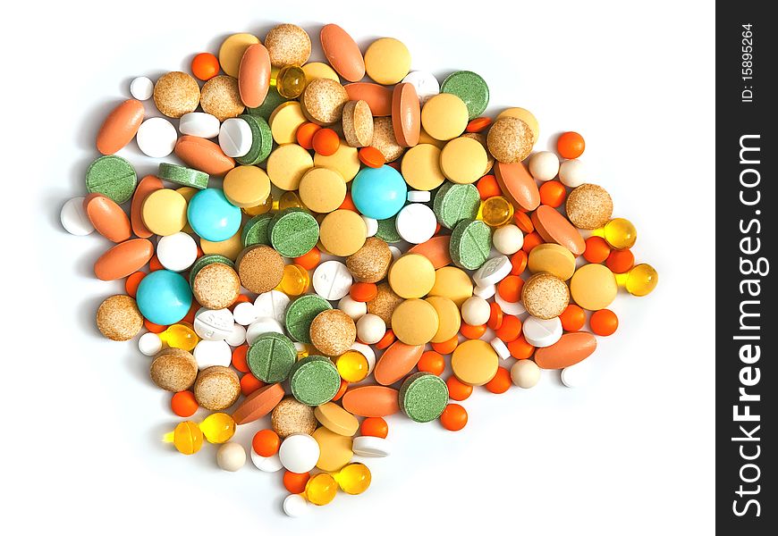 Heap of pills isolated on a white background