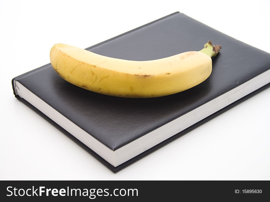 Banana onto black Adress book. Banana onto black Adress book