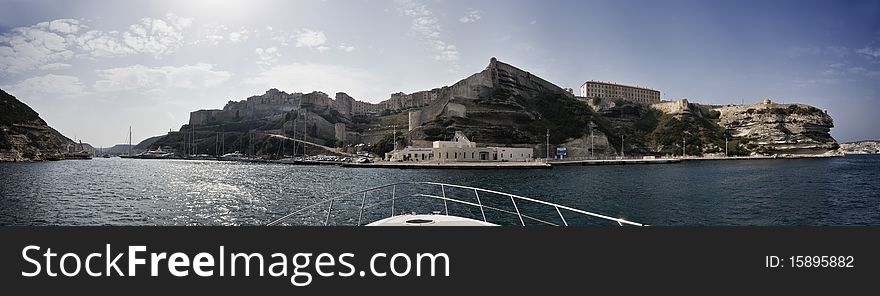 France, Corsica, panoramic view of Bonifacio port entrance. France, Corsica, panoramic view of Bonifacio port entrance