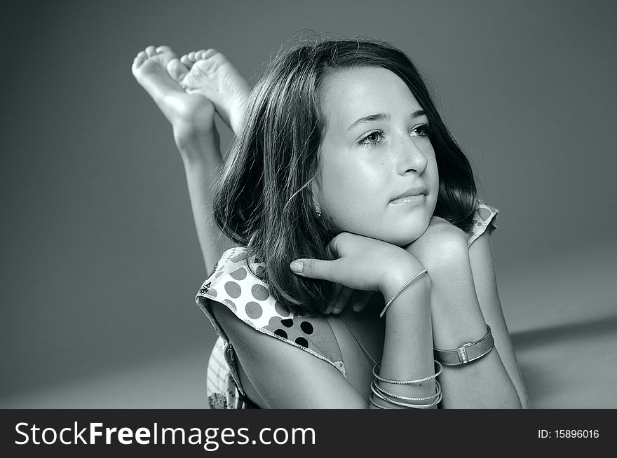 White teenager showing accessories in studio. White teenager showing accessories in studio