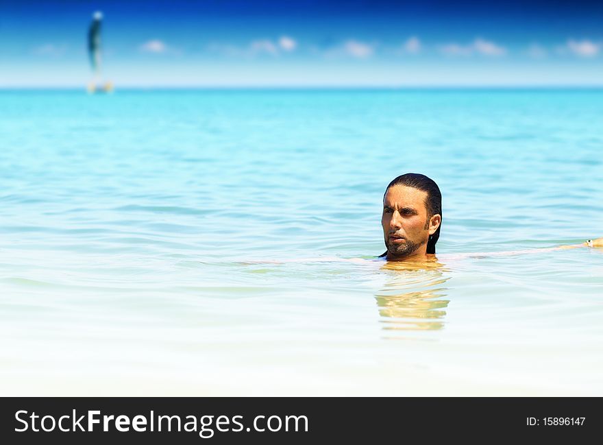 Portrait of a man enjoying warm tropical waters. Portrait of a man enjoying warm tropical waters