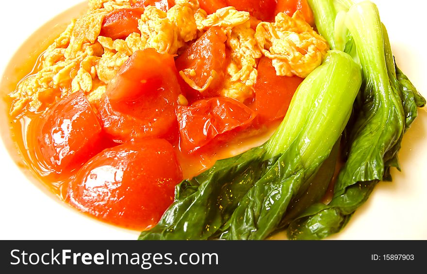 Scrambled eggs with tomatoes ,the most common home cooking in china. Scrambled eggs with tomatoes ,the most common home cooking in china.