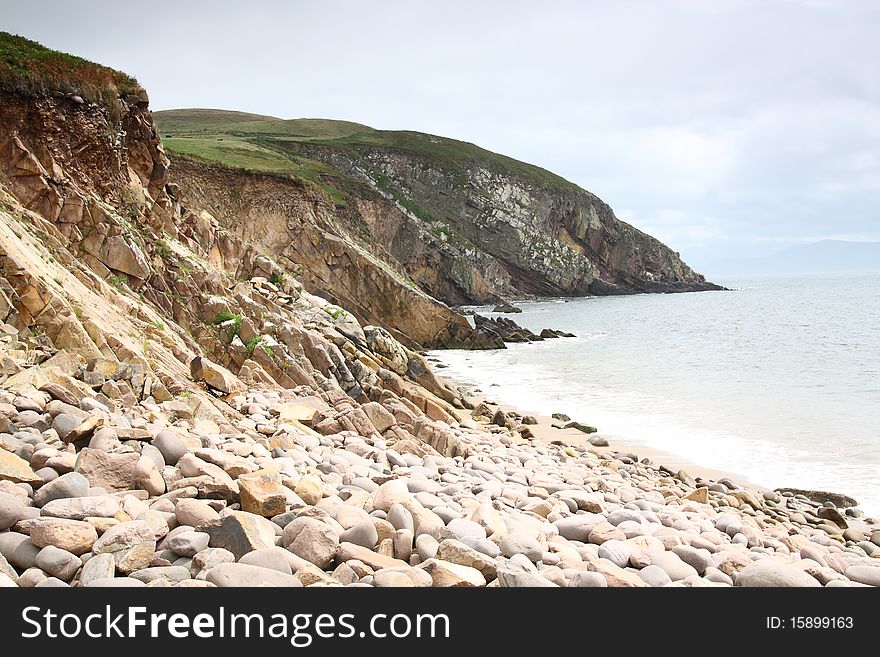 View of Coast near Minard Castle, Dingle Peninsula, Co.Kerry, Ireland with rocks in foreground