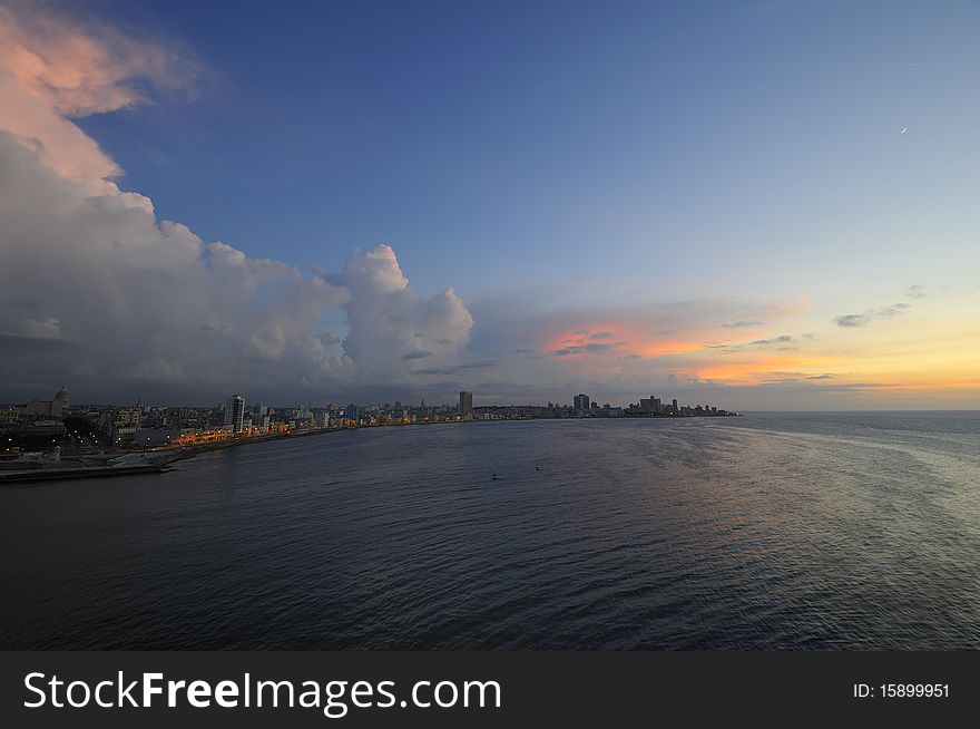 Beautiful Havana cityscape at with dramatic colorful clouds at nightfall. Beautiful Havana cityscape at with dramatic colorful clouds at nightfall