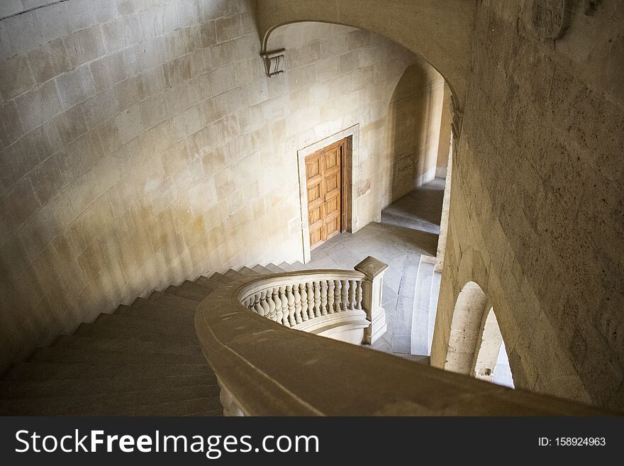 A high angle shot of white staircases inside a building