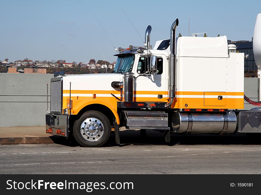 Eighteen Wheeler Cargo Trucked Waiting on Street