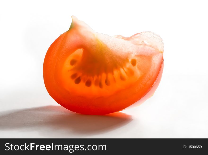 Tomato slices, lobules on the white