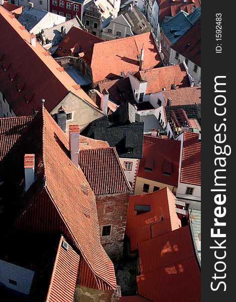 Old roofs with chimneys in the city centre of Cesky Krumlov. Old roofs with chimneys in the city centre of Cesky Krumlov