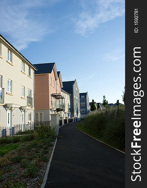 Newly built houses alongside a path. Newly built houses alongside a path