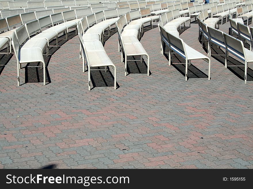 Curved benches in an outdoor performance area
