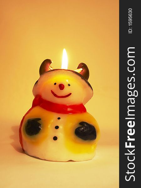 Joyful christmas candle for yellow background