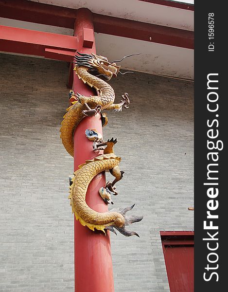 Ornament on pillar depict a dragon. Ornament on pillar depict a dragon