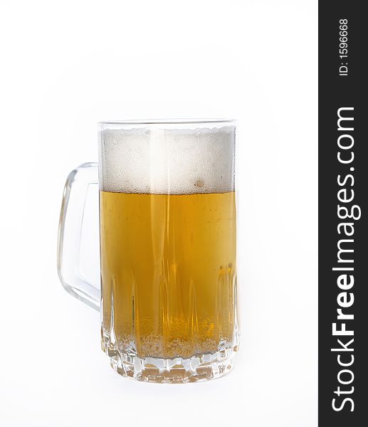 Full mug of beer over white. Full mug of beer over white