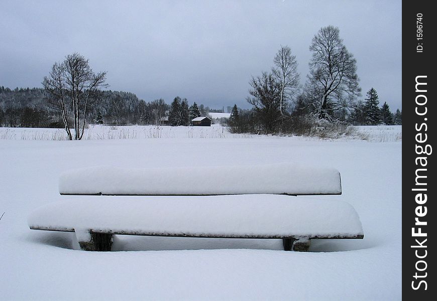 Snowed-in Bank In Winter Landscape