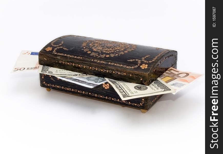 Old jewelry box with money inside over white background