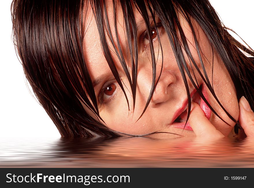 Brunette Wet Woman Laying in Water. Brunette Wet Woman Laying in Water