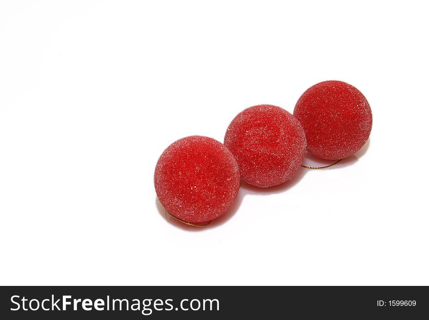 Red christmas balls isolated over white