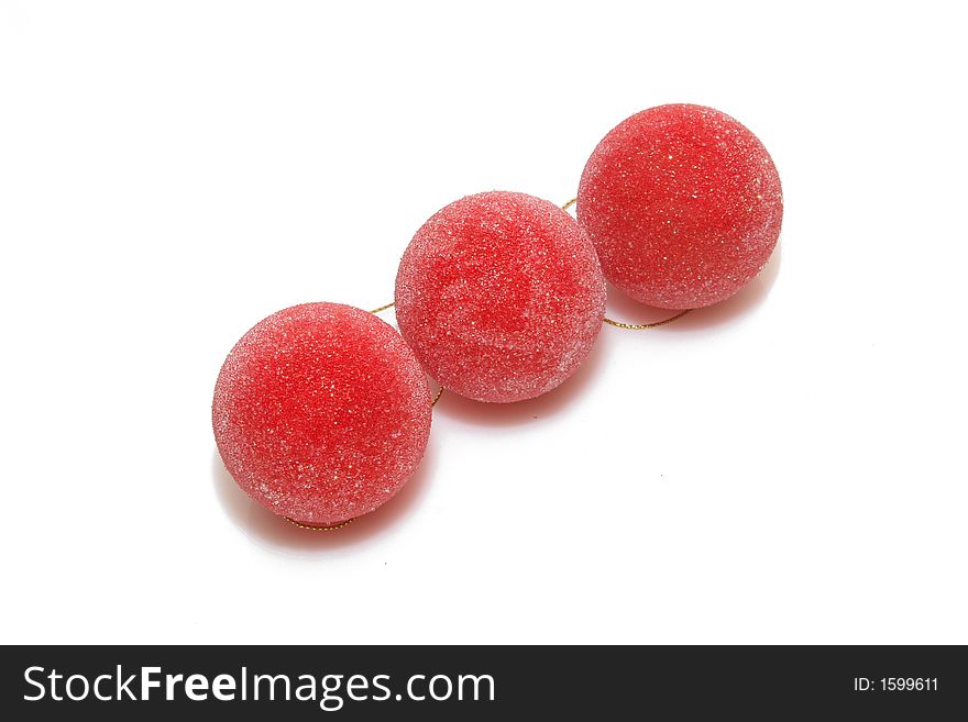 Red christmas balls isolated over white