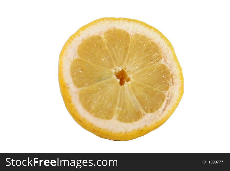 Yellow lemon half isolated over white