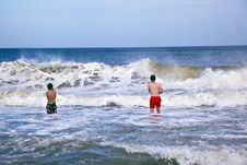 Brothers Are Playing Together In The Sea Royalty Free Stock Photography