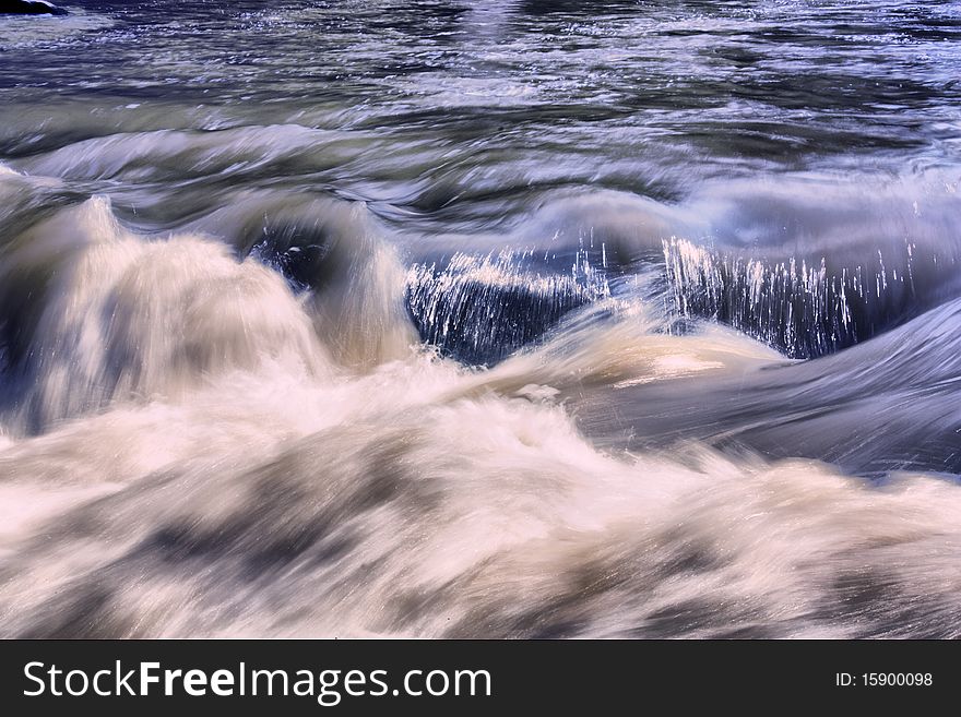 Fast water stream of mountain river