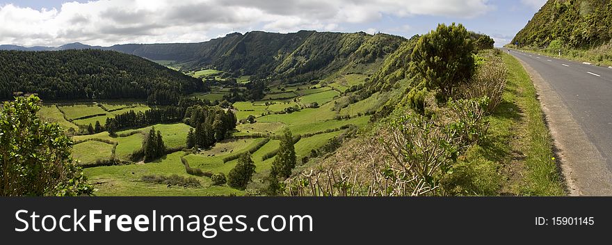 Panorama of a road and a green valley. Panorama of a road and a green valley