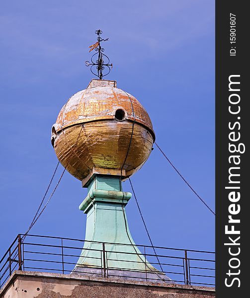 The Golden Ball Monument and weathervain on top of West Wycombe Church Tower in England