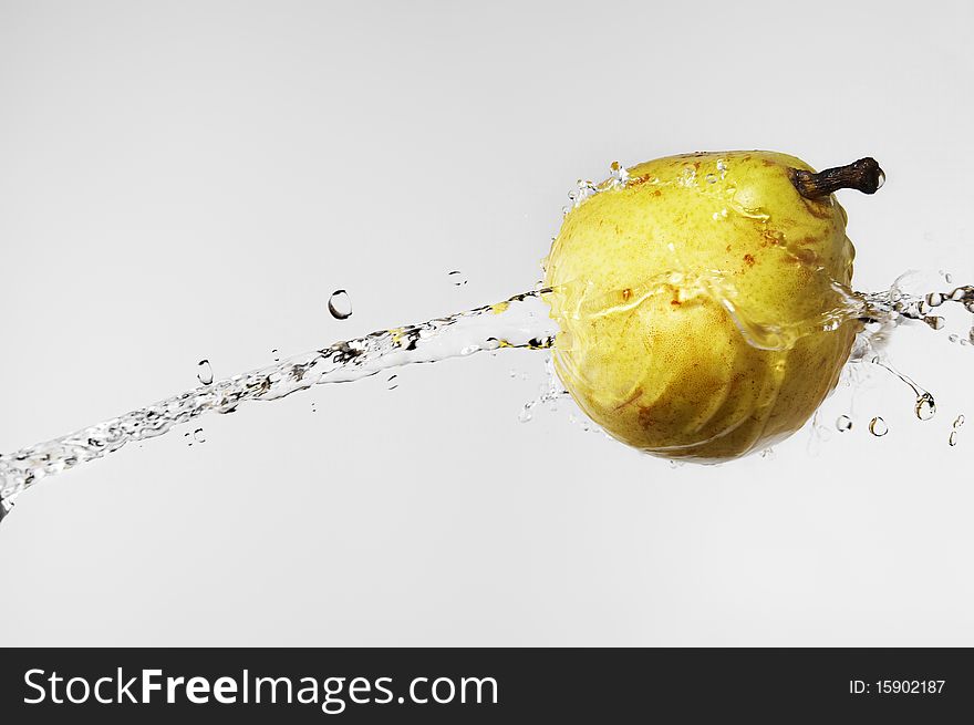 Yellow Pear In Water Splash
