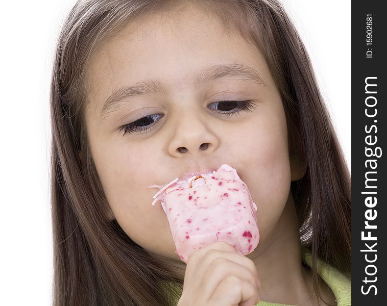 A little girl eats an ice cream. Isolated on white. A little girl eats an ice cream. Isolated on white