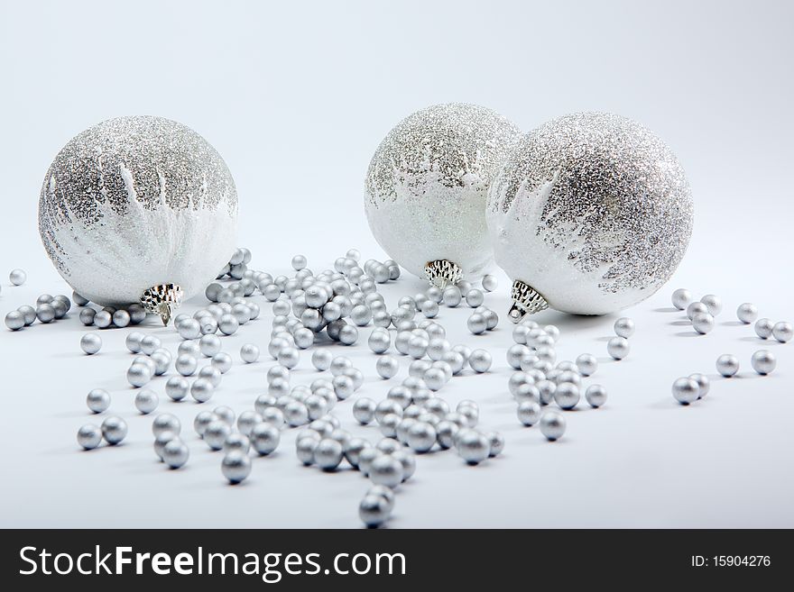 Silver balls on white background