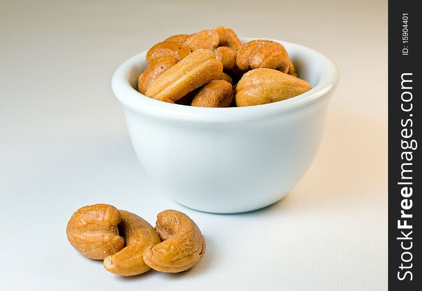 Pile of cashew nuts in gradient background