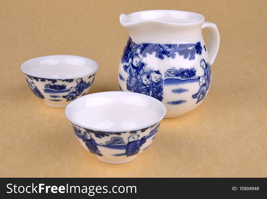 A set of Chinese blue painting drawing tea wear including pot and cup, shown as chinese traditional culture and tea culture. A set of Chinese blue painting drawing tea wear including pot and cup, shown as chinese traditional culture and tea culture.