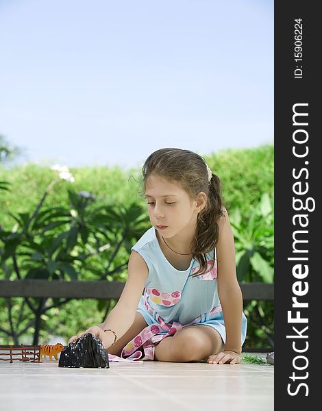 Portrait of little girl having good time in summer environment. Portrait of little girl having good time in summer environment