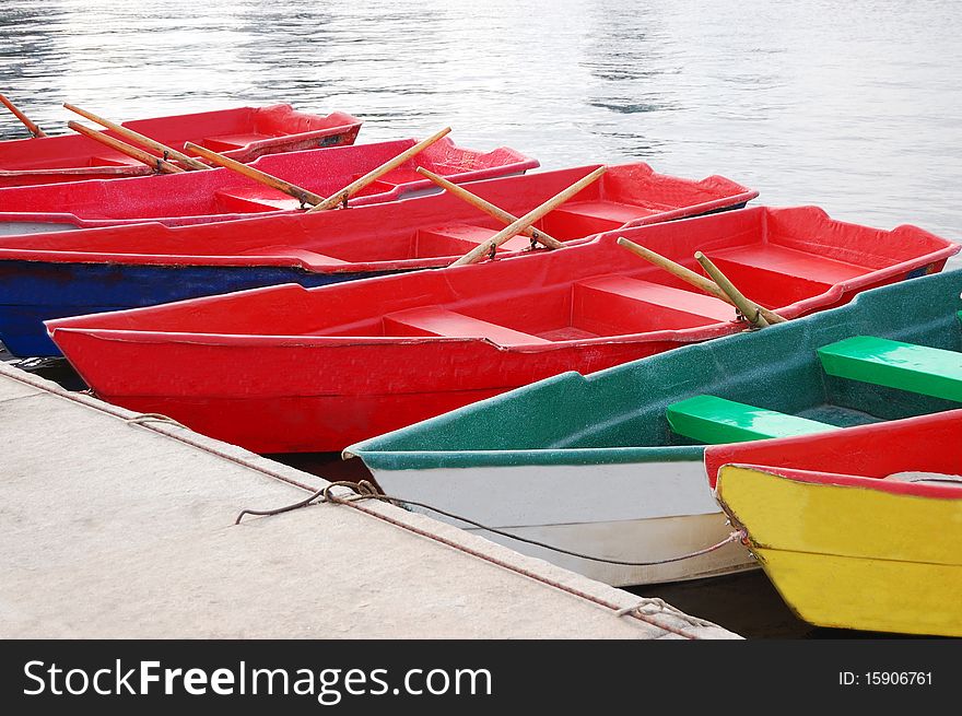 Many colorful boats at lake