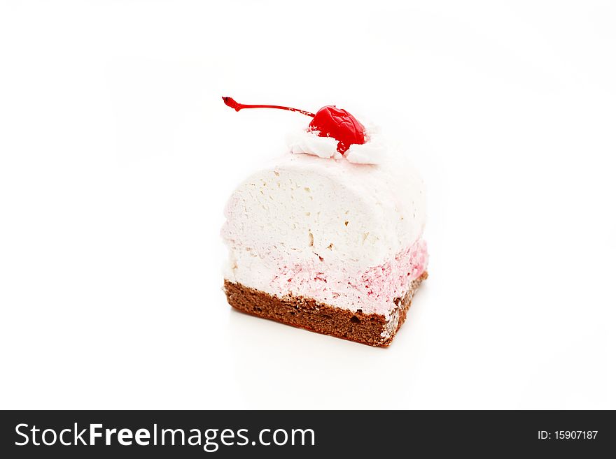 An image of a cake with cherry on top. On white background. An image of a cake with cherry on top. On white background.