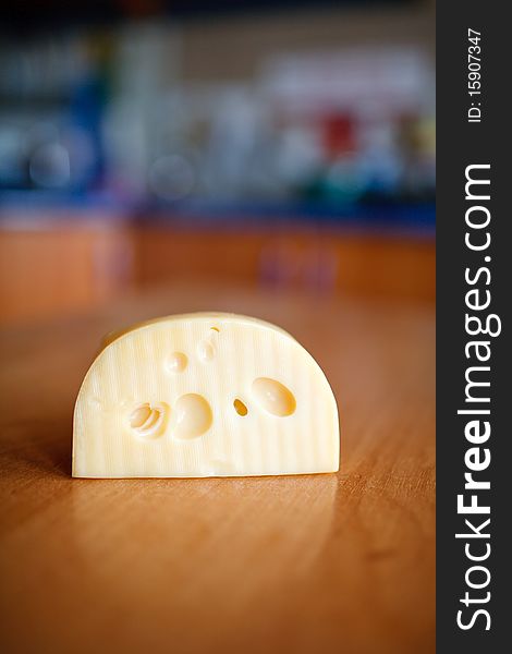 An image of slab of cheese on table