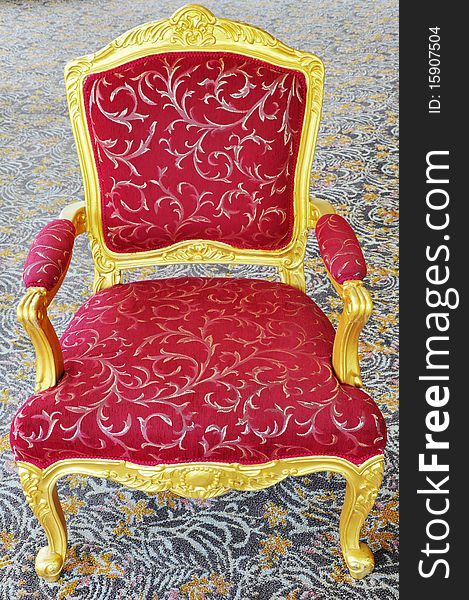Red luxury armchair on carpet. Red luxury armchair on carpet.