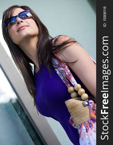 Beautiful woman at a shopping center with bags