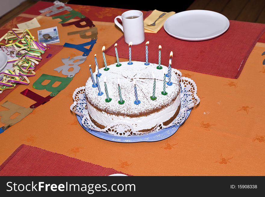 Birthday cake at the table early morning ready for celebration