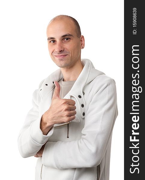 Happy casual young man showing thumb