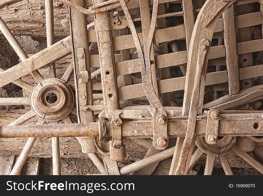 Pieces from old cart still life - dusty wood texture