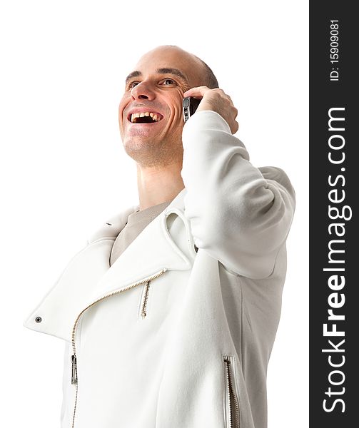 Man smiling and talking on a mobile phone