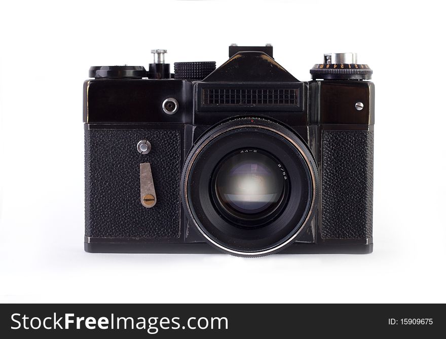 Old photo camera isolated on white background.